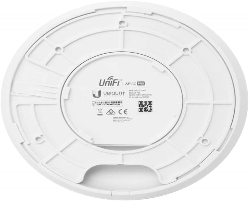 White Ubiquiti UniFi AP AC Pro wireless access point on a white background