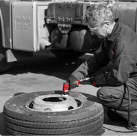 A man uses a Chicago Pneumatic