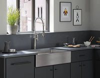 Modern kitchen with stainless steel faucet