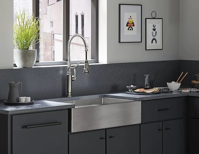 Modern kitchen with stainless steel faucet