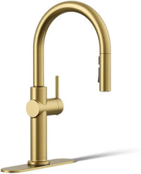 Gold kitchen faucet on a white background