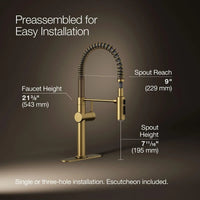 Gold kitchen faucet with measurement details on a dark background