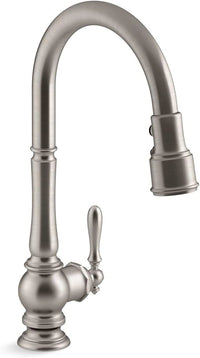 Stainless steel kitchen faucet on a white background