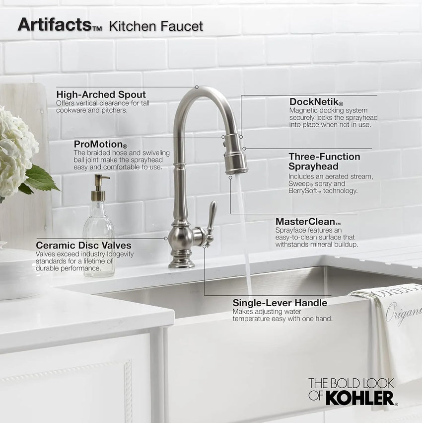 Kohler Artifacts kitchen faucet with features listed on a tiled wall background
