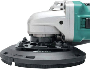 Green and silver angle grinder on a white background