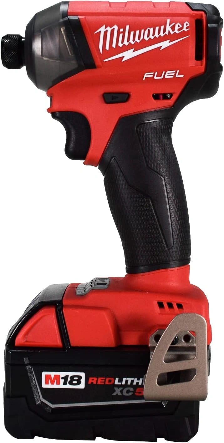 Red Milwaukee power drill on a white background